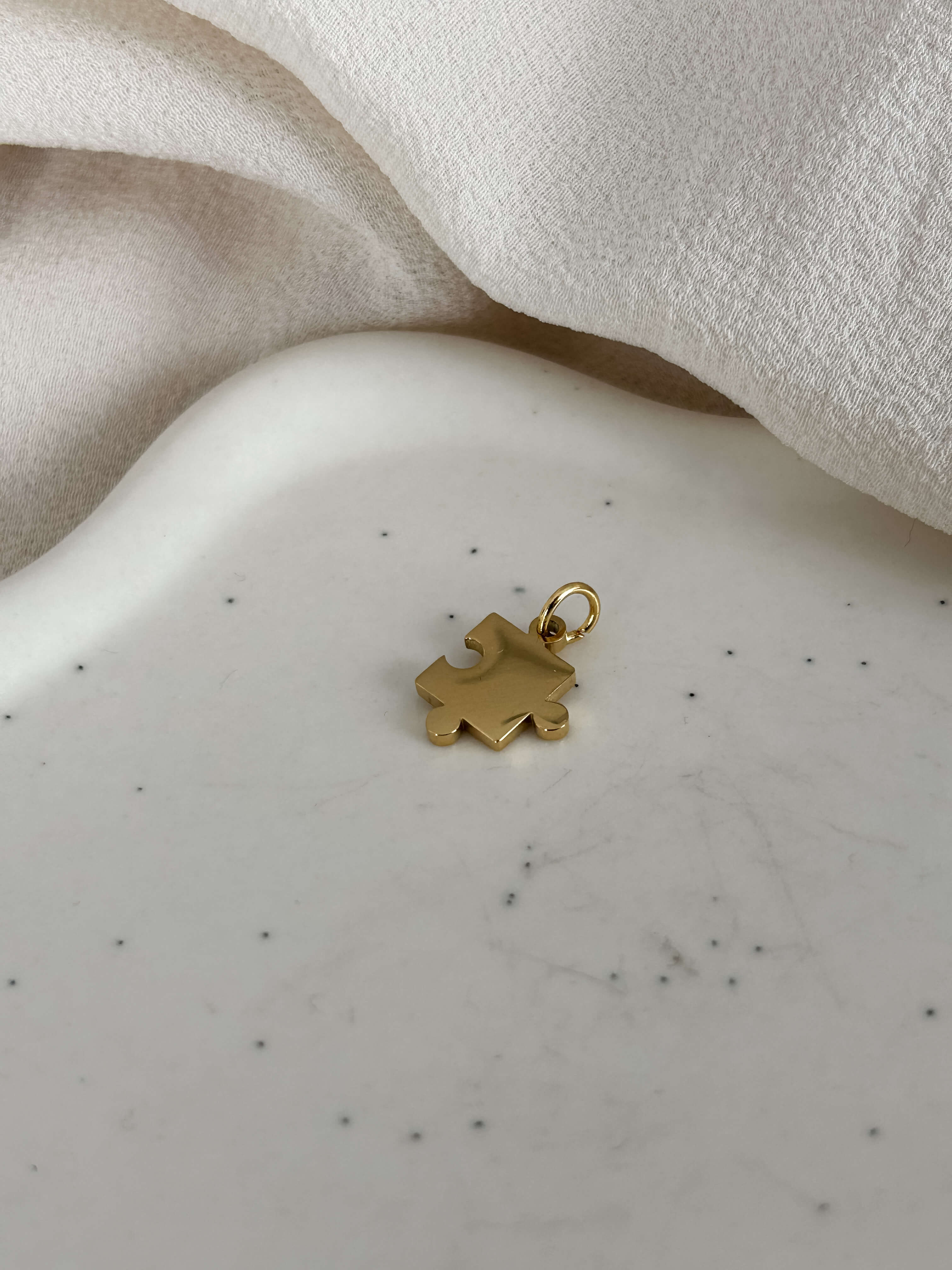 CIONDOLINO “Puzzle” - acciaio