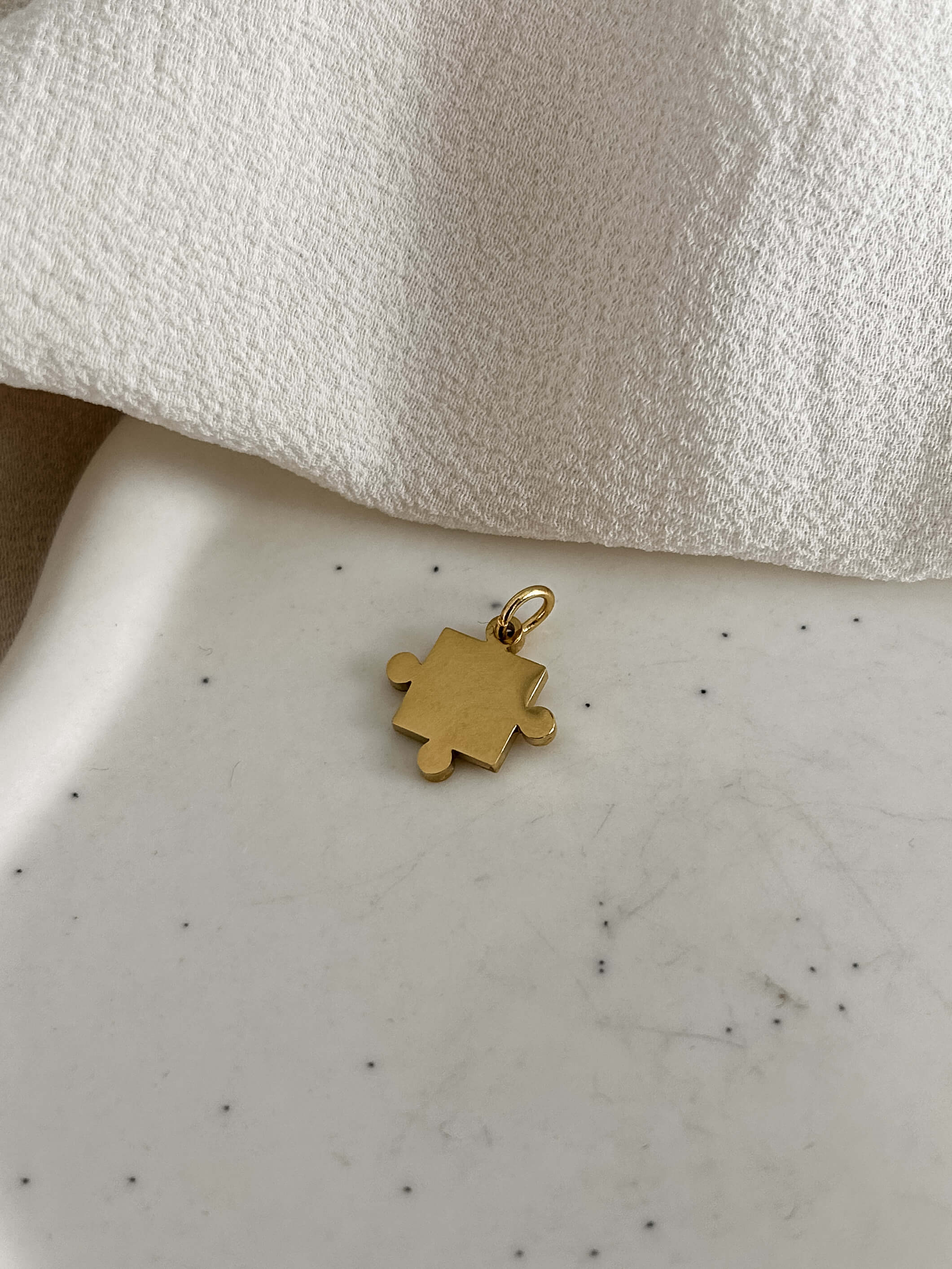 CIONDOLINO “Puzzle” - acciaio